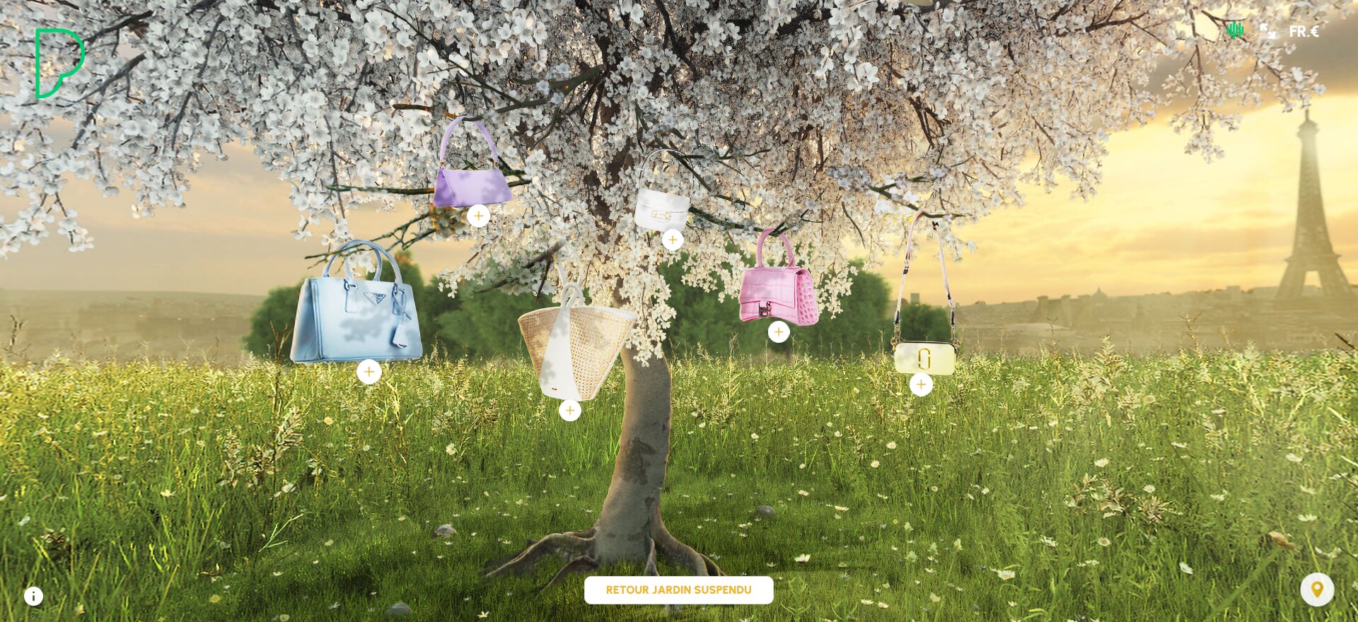 Printemps présente des sacs en les accrochant à un arbre. - © Printemps