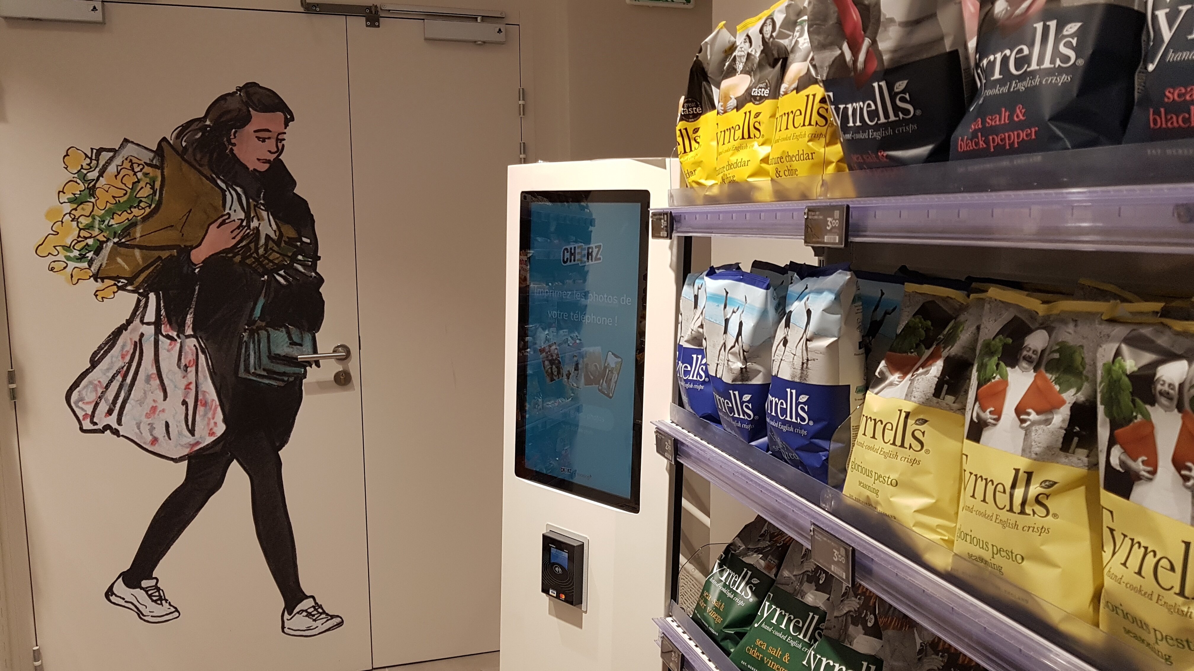 Une borne permet d’imprimer des photos depuis son smartphone.  - © CC / Républik Retail