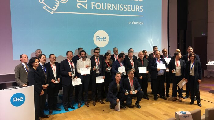 Les représentants des 17 fournisseurs distingués réunis au siège de RTE. - © D.R.