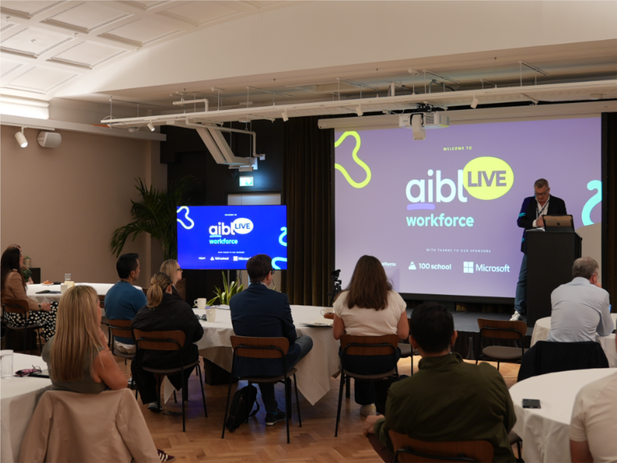 a gathering of senior HR leaders at an ai adoption event